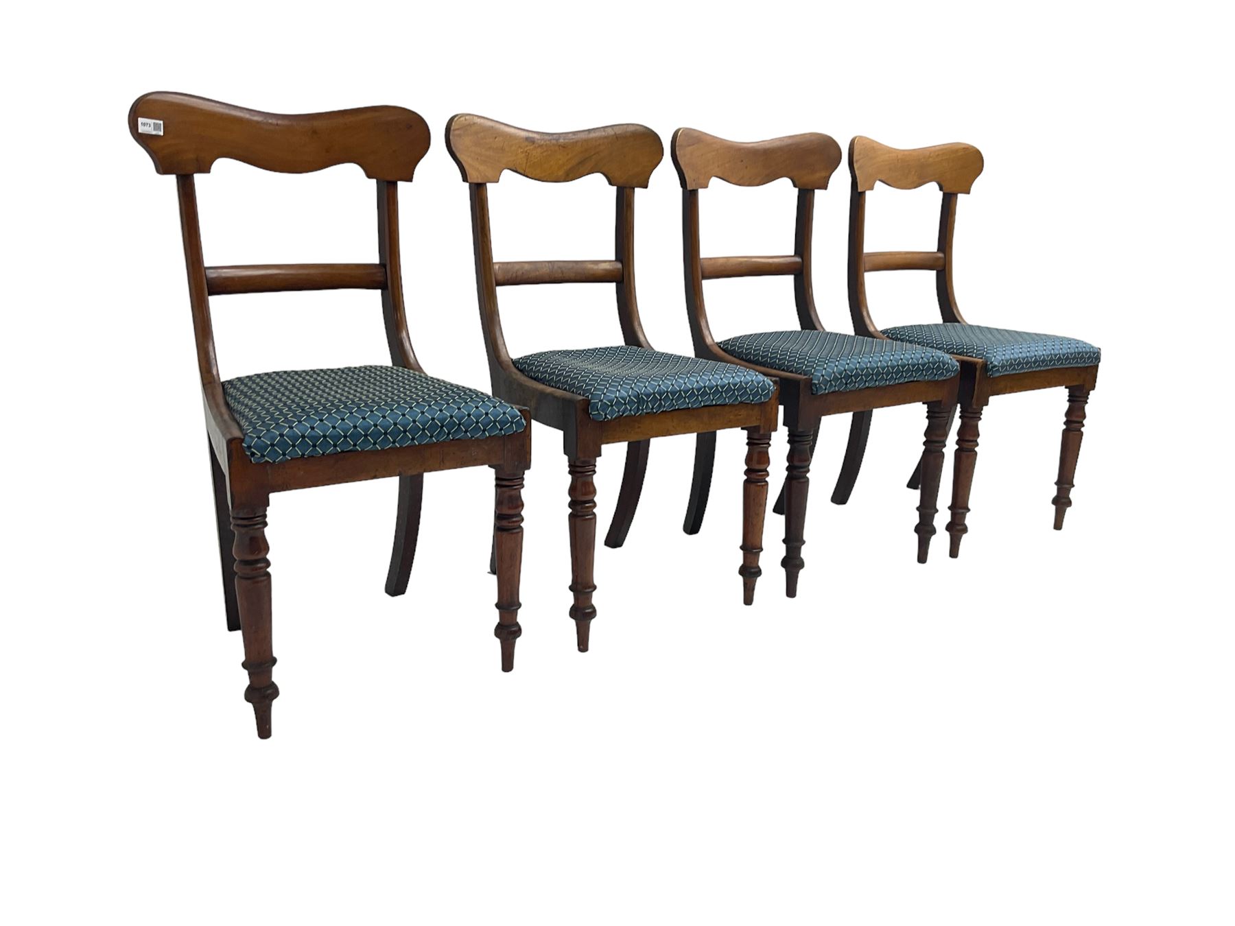 Set four Victorian mahogany dining chairs, shaped cresting rail over centre rail, seat upholstered in blue patterned fabric, raised on turned supports