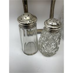 Clear glass decanter of slender oviform with silver collar stamped MN & WB 925, Mappin & Webb, together with an early 20th century silver photo frame hallmarked G & C Ltd of Birmingham, two clear glass shakers with pierced silver tops and silver collared glass storm lampshade with etched decoration, tallest H37.5cm
