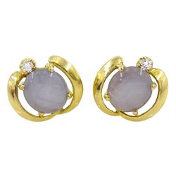 Pair of 18ct gold purple star sapphire and round brilliant cut diamond stud earrings