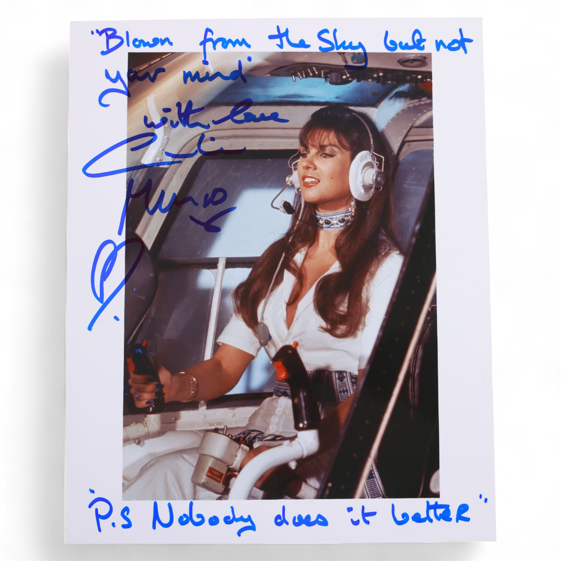 Eight James Bond signed 10 x 8