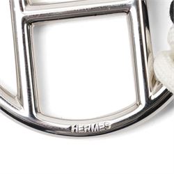 Hermès - long multi-cord belt in black, white and camel, suspending a large palladium-tone circular openwork H pendant, signed HERMES, in original box