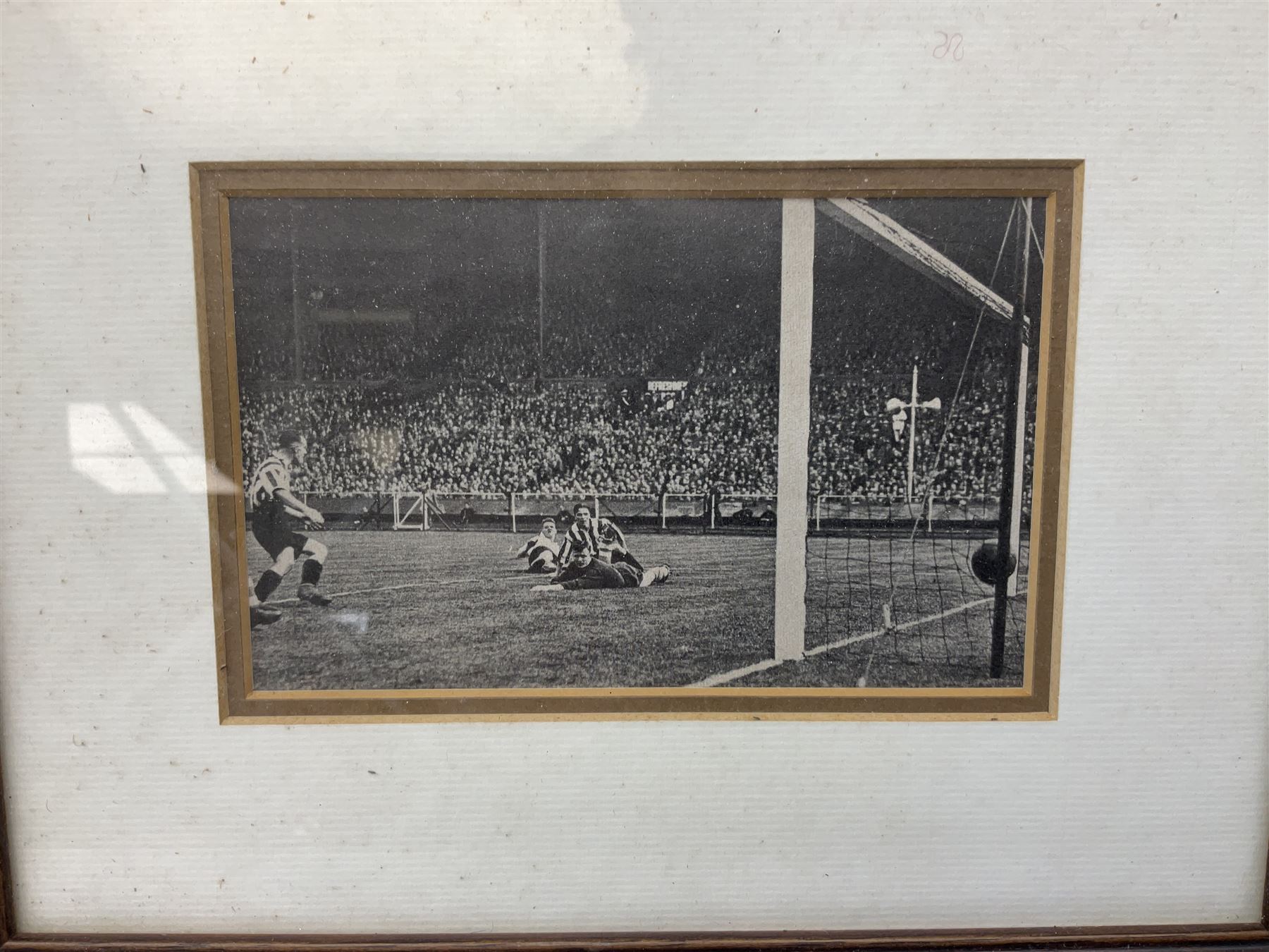 Limited edition First Day Cover 1987 for Sunderland's 50th Anniversary of Winning the F.A. Cup; signed by Raich Carter and Bobby Gurney No.1sp/500; limited edition First Day Cover 1993 to celebrate Raich Carter's 80th Birthday No.1aSp/100; photograph of the RAF XI v Scotland team including Carter and Stanley Matthews; photograph of Carter scoring against Preston N.E. in 1937; photograph of the Hull City squad on tour to Tel Aviv 1949; and photographic print entitled 'North v South Trial Match Bournemouth 2-4-27 Northern Boys' with manuscript note verso by Carter identifying which is him; all framed; Provenance: By direct descent from the family of Raich Carter having been consigned by his daughter Jane Carter (6)