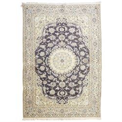 Central Persian Nain hand-knotted carpet, indigo field with central cusped medallion of ra...