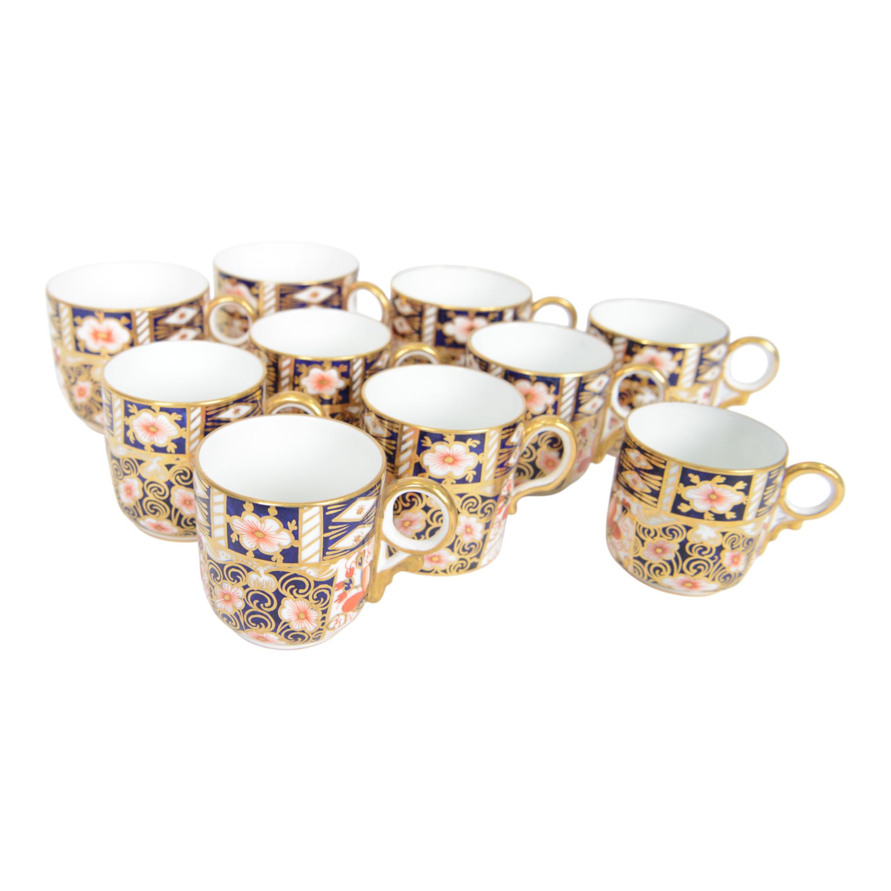 Royal Crown Derby Imari 2451 pattern, cups and saucers of various sizes, comprising ten cups and nine saucers  