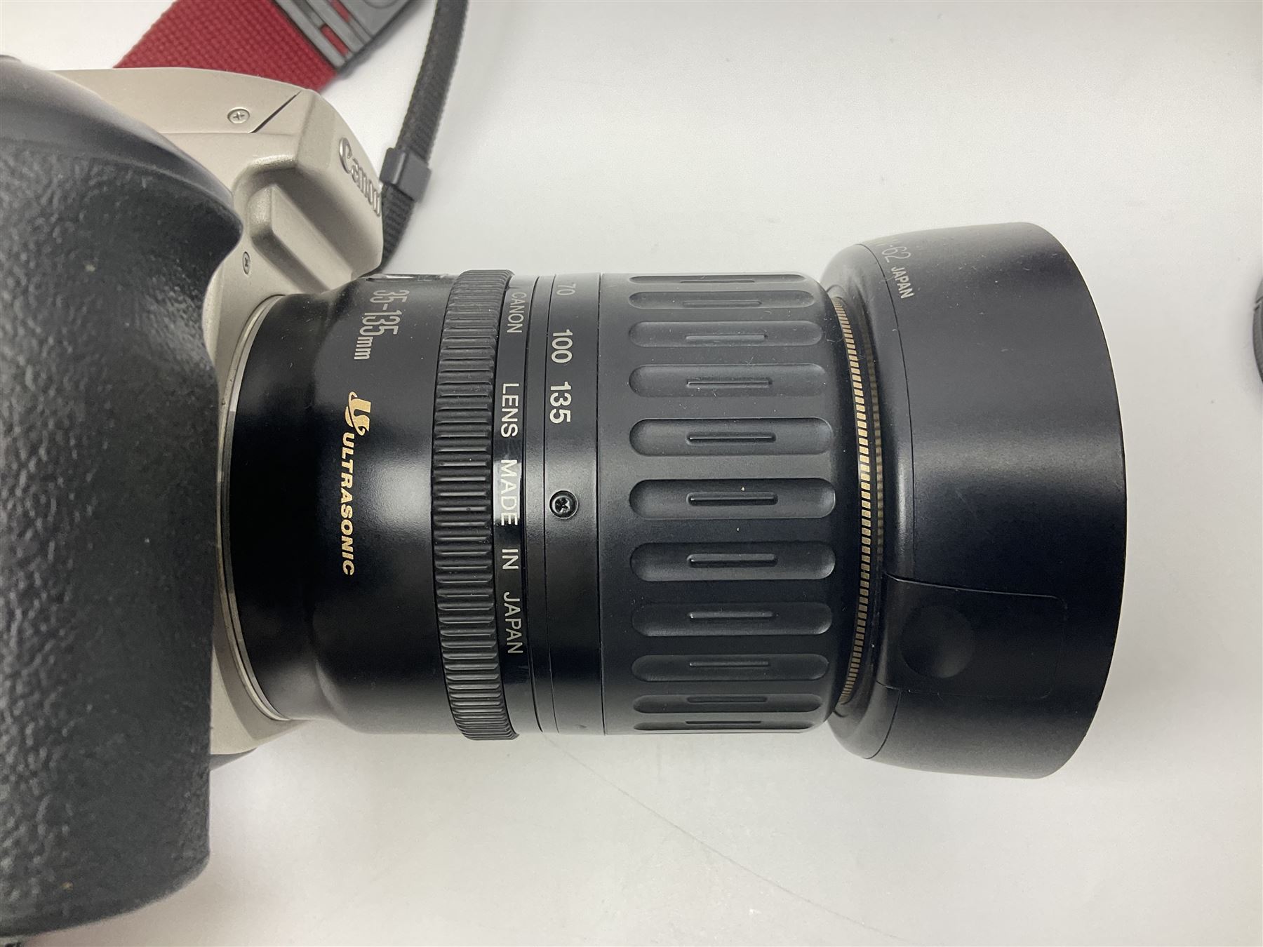 Canon EOS 50e camera body, serial no 8305671 with 'Canon Zoom EF 35-135mm 1:4-5.6' lens together with Halina 35X super camera body, with 'Halina Anastigmat f.c. 1:3.5 f=45mm' lens and other camera equipment 