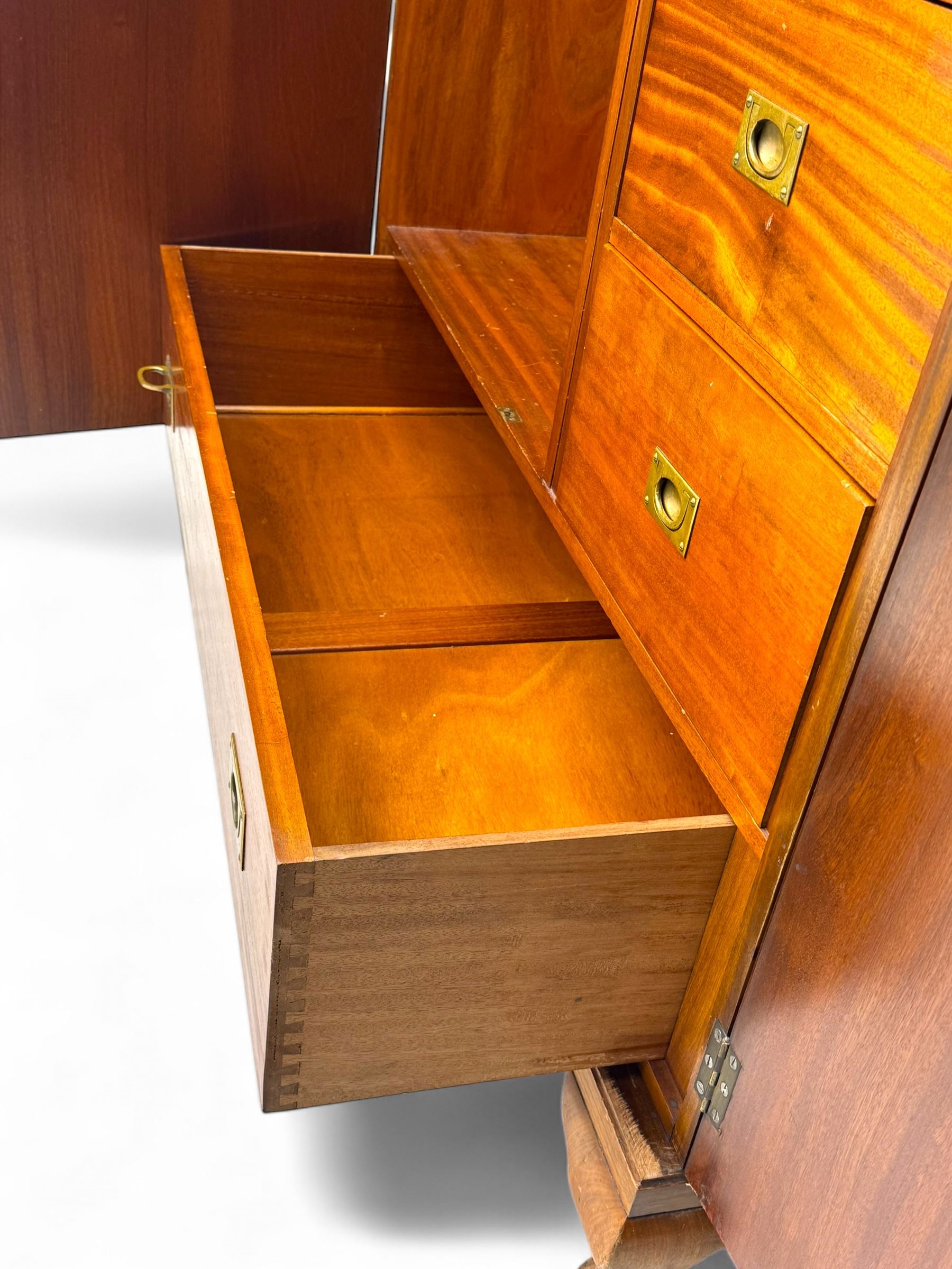 Ashton Leach & Cumberbirch Ltd., Rochdale - early 20th century walnut and mahogany gentleman's wardrobe, arched moulded top with book-matched figured walnut veneers, double doors enclosing fitted interior with hanging rail, tie rack and drawers, raised on cabriole supports