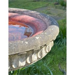 Reconstituted stone garden bird bath, the circular top with moulded waterleaf design on a pedestal decorated with floral motifs. H87cm, D59cm. - COLLECTION BY APPOINTMENT FROM: The White House, Thirsk Road, Easingwold, York, YO61 3NF - CALL 01723 507111 TO ARRANGE
