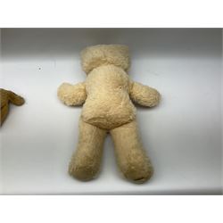 Mid-20th century English plush covered woodwool filled dog with vertically stitched nose and mouth L39cm; and Wendy Boston plush covered teddy bear, the fixed head with applied eyes and vertically stitched nose and mouth H63cm (2)