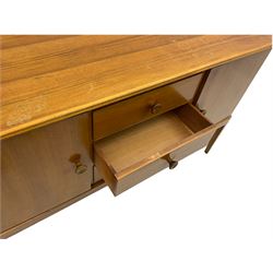 Gordon Russell - mid century walnut sideboard, fitted with three drawers, and two cupboards
