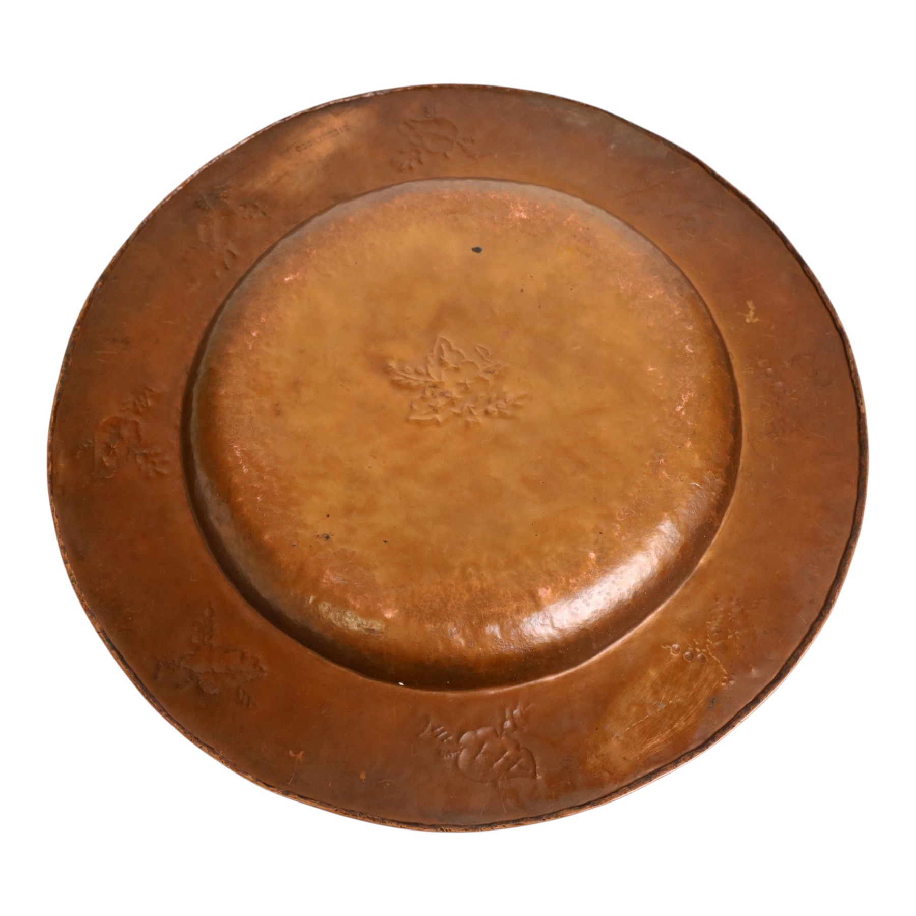 Arts & Crafts Liberty & Co copper charger embossed with stylised leaf design, stamped underneath rim, D44cm