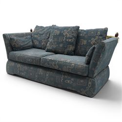 Edwardian design Knole-type drop-end two seat sofa, of traditional shape with hinged drop arms held by ropetwist tassels, upholstered in cobalt blue geometric patterned fabric, with loose seat and scatter cushions; together with matching ottoman footstool (W70cm D55cm H39cm)