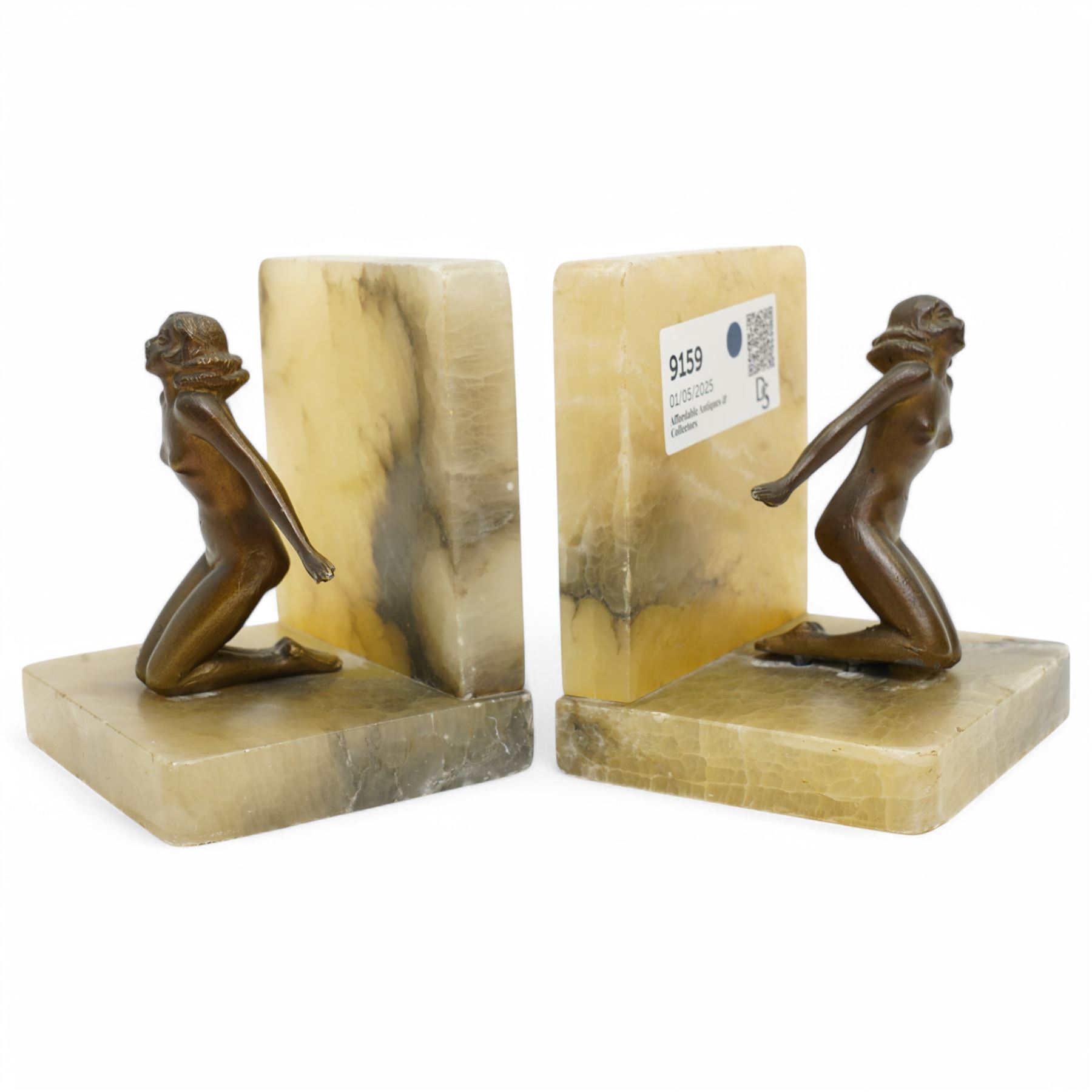 Pair of onyx bookends with bronze female figures