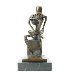 Bronze skeleton modelled as 'The Thinker', on black marble base, signed 'Milo' to plinth, H15cm