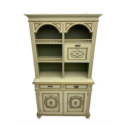 Portuguese painted dresser, two-tier plate rack with spindle gallery and fall-front cupboard, flanked by fluted uprights, fitted with two drawers over two cupboards, the panelled cupboards with floral decoration and a rinceaux border, white painted and parcel-gilt 