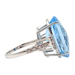  Large 18ct white gold (tested) oval Swiss blue topaz and diamond cocktail ring, topaz approx 19 carat  