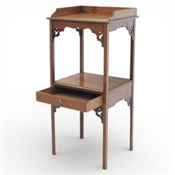 George III mahogany two tier night stand, rectangular tray top with three quarter gallery and shaped cut corners, pierced fret brackets to the apron, fitted with a single drawer to the lower tier, raised on slender square section legs