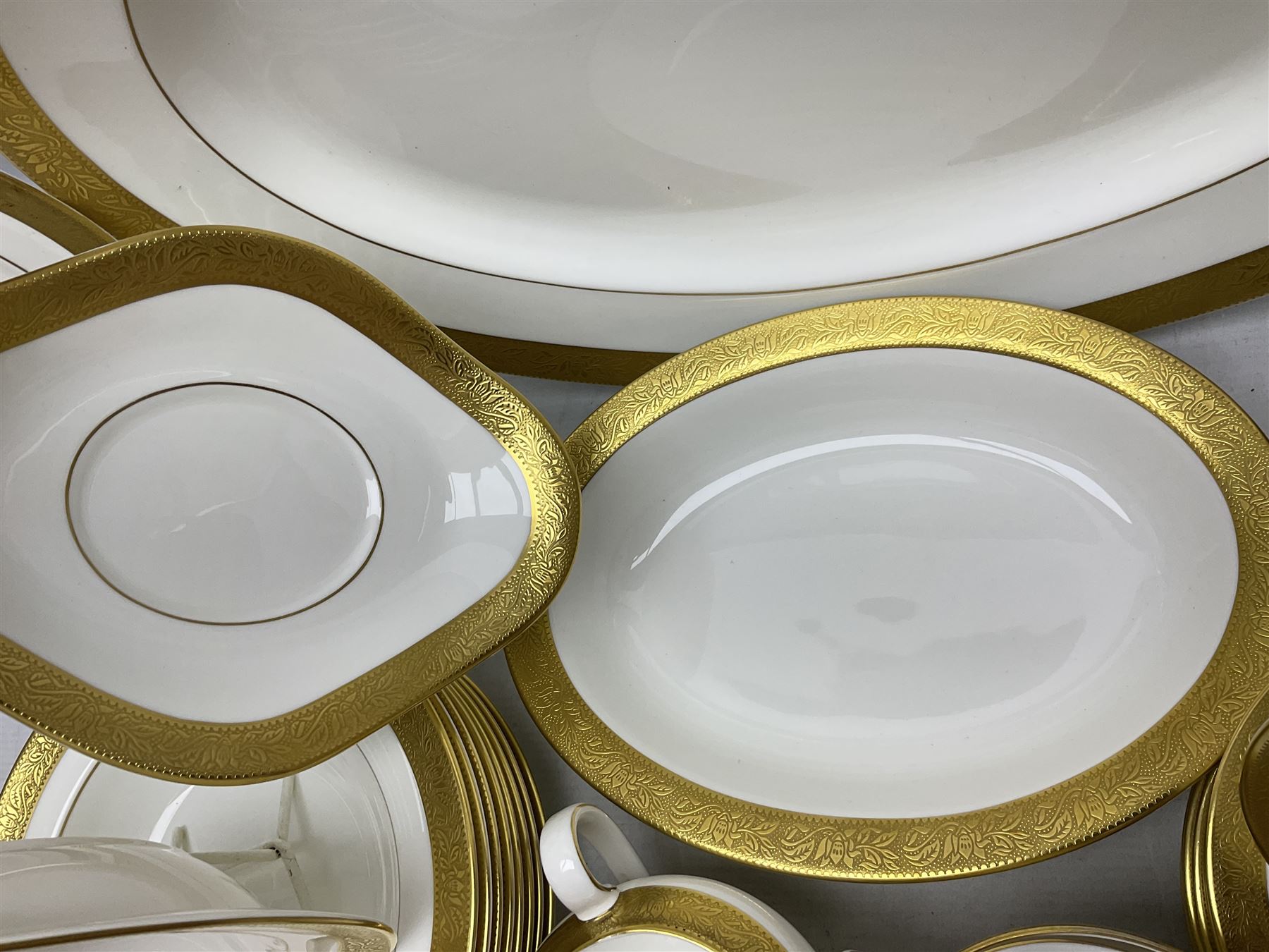 Wedgwood Ascot pattern part tea and dinner service, comprising eleven dinner plates, ten small dinner plates, nine bowls, eight dessert plates, seven saucers, nine tea cups, sauce boat and stand, milk jug, two twin handled soup bowls, serving dish and meat platter (60)