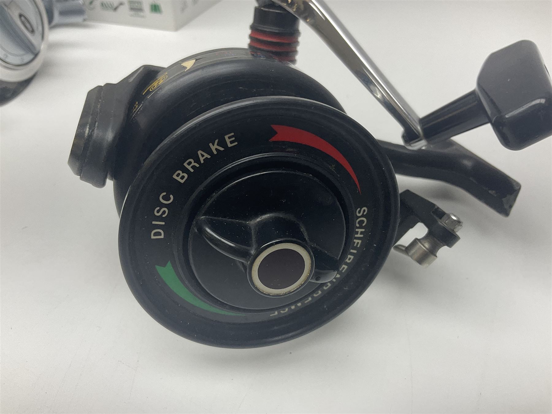 Four fixed spool reels, all in original boxes, comprising Shimano Ultegra 5500 XSD, with spare spool, Mitchell Autosurf 700, with spare spool, Shimano Sedona 600 FB with spare spool and D.A.M Quick 5001