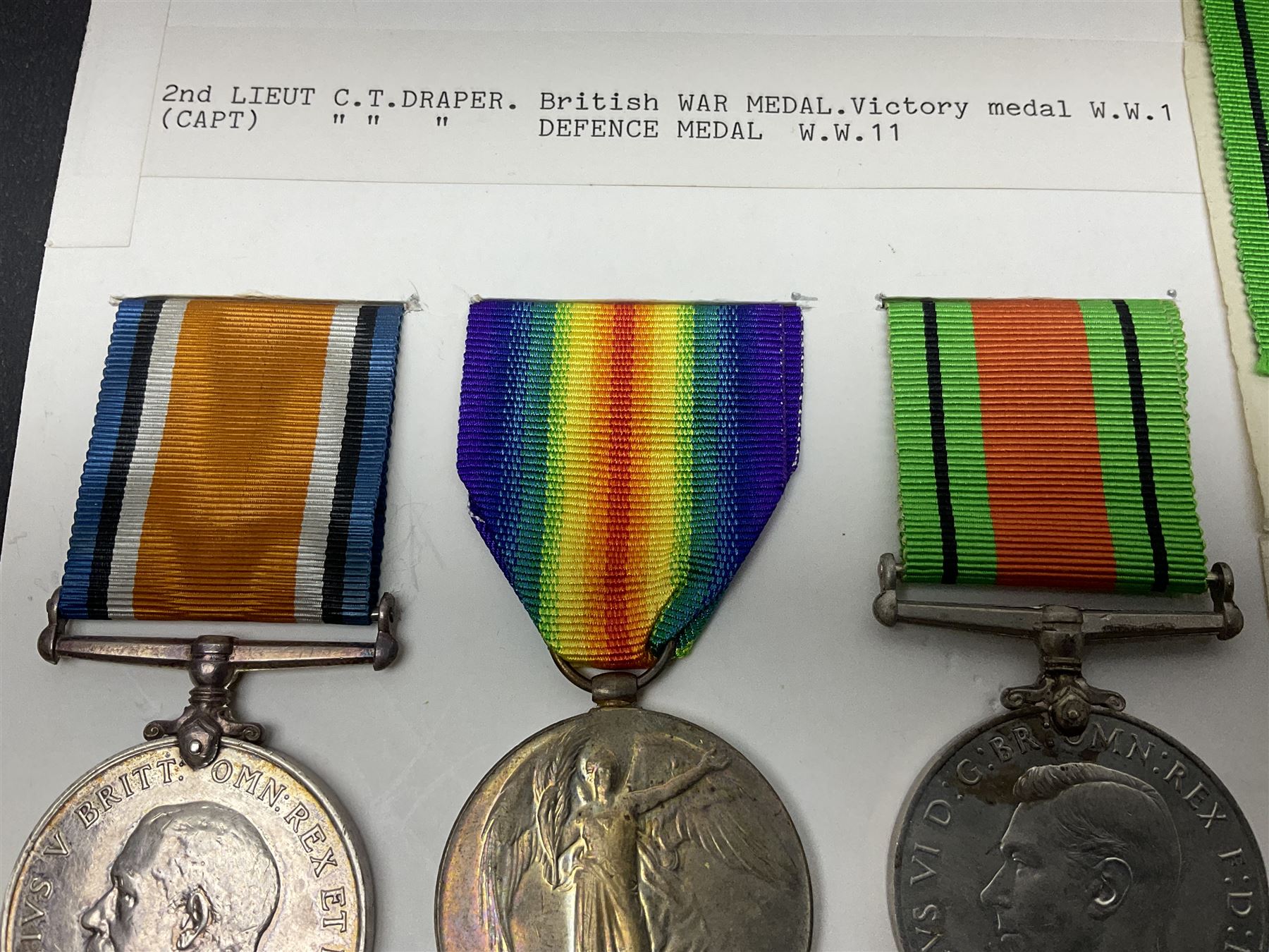 WWI pair of medals comprising British War Medal and Victory Medal awarded to 2nd Lieutenant C.T. Draper; and WWII Defence Medal awarded to Captain C.T. Draper with War Office letter of confirmation; all with ribbons (3)