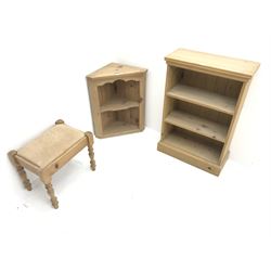 Narrow pine open bookcase, two shelves, plinth base (W62cm, H93cm, D26cm) a pine wall hanging cupboard (W58cm, H69cm, D32cm) and stool