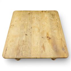 20th century stripped pine coffee table, square top over two frieze drawers, raised on block and turned supports