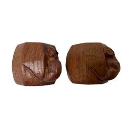 Mouseman - pair of oak napkin rings, of bulbous octagonal form each carved with mouse signature, by the workshop of Robert Thompson, Kilburn, L4cm W6cm