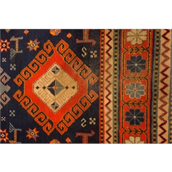  Turkish blue ground rug, geometric and stylised design, 207cm x 126cm  