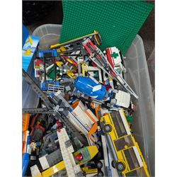 Large collection of Lego, including partially built vehicles, Police Station, Lego Creator 31010 and a collection of Lego instruction booklets