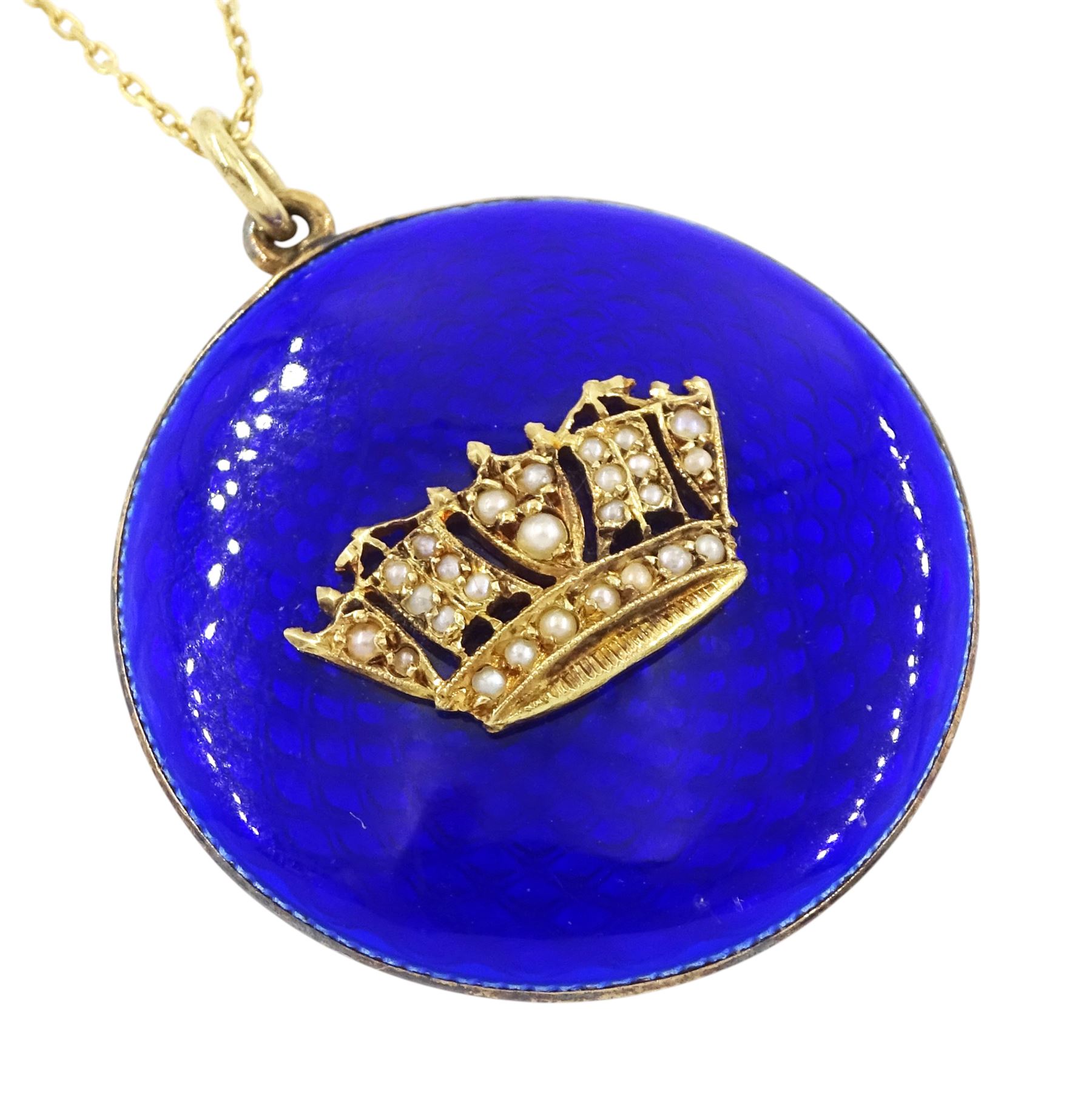 Early 20th century gold blue enamel pendant, with applied seed pearl Navel crown decoration, with glazed back, stamped 9ct, on later 9ct gold chain necklace, stamped 375