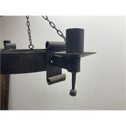 Pair of gothic style wrought iron ceiling lights, each with four branches, D58cm