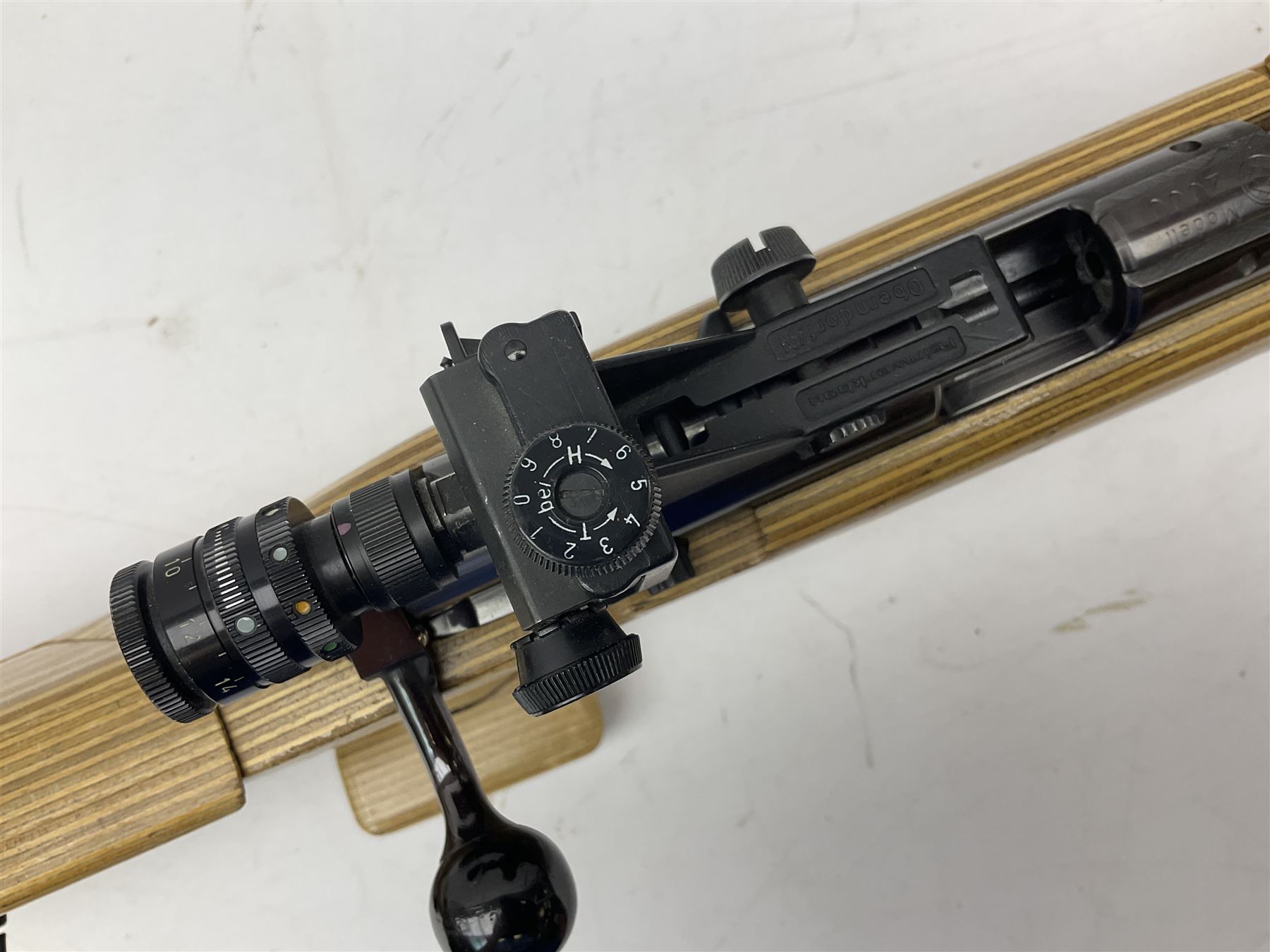 Feinwerkbau, Westinger & Altenburger Germany .22 LR bolt-action target rifle with 67cm barrel, fully adjustable weights and laminated stock, sliding weight rails and vernier rear sight; bi-pod rest at front; No.4225 L123.5cm overall SECTION 1 FIRE-ARMS CERTIFICATE REQUIRED       

