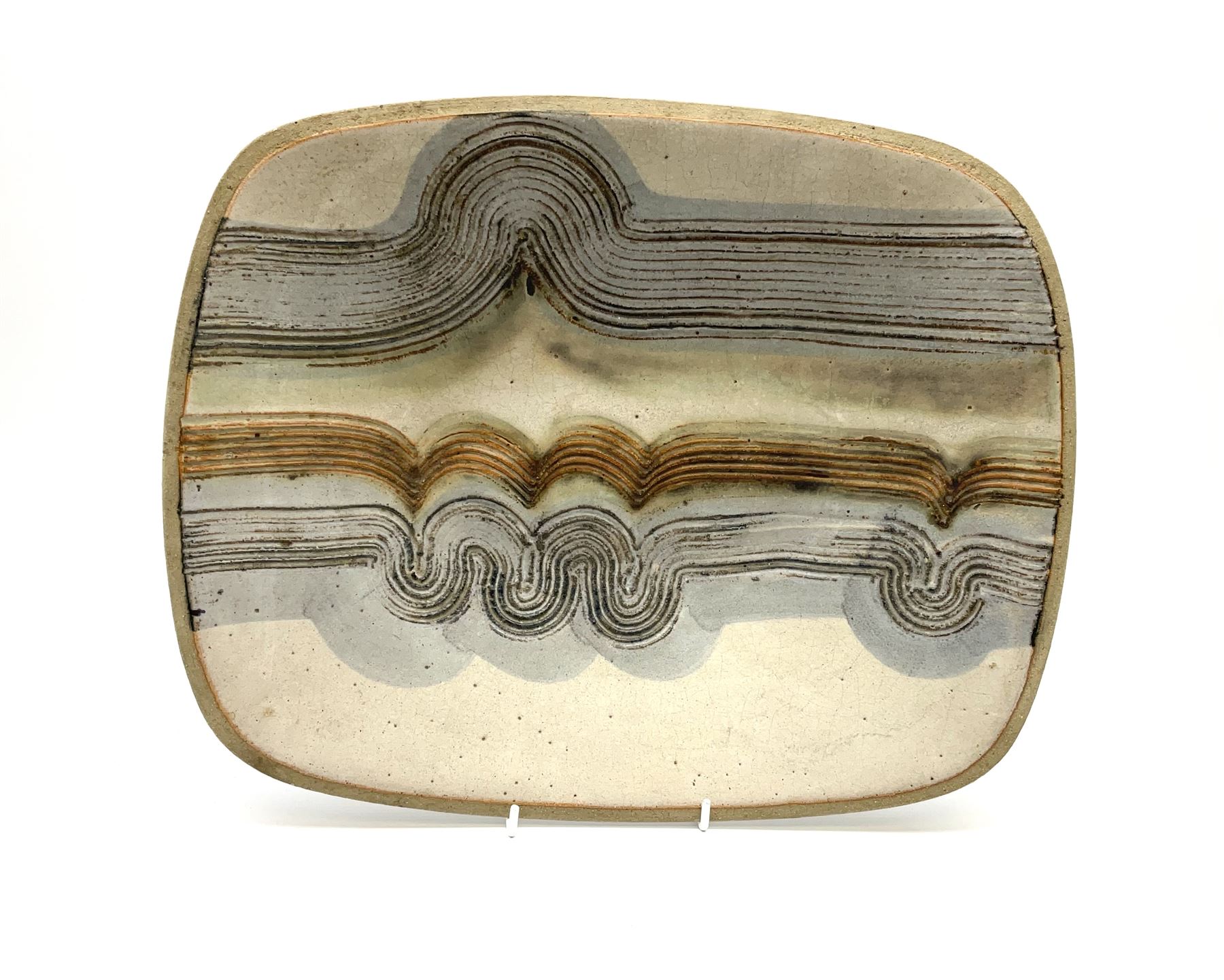 A Keith Hall Llandaff Studio Pottery dish, of oblong form with incised decoration, marked beneath Keith Hall Llandaff, and dated 1971, L35.5cm.