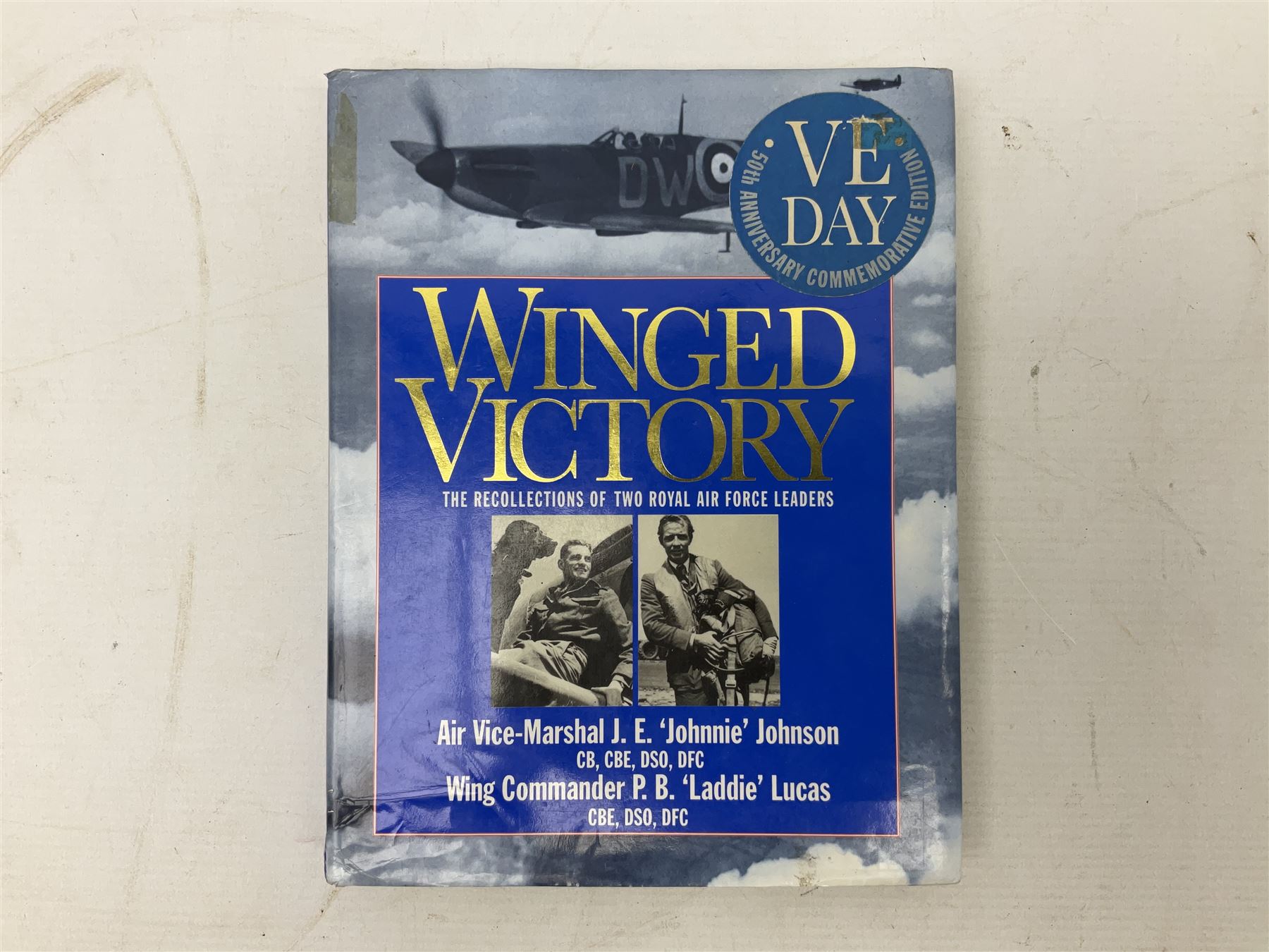 Winged Victory. 1995. Loose mounted signed dedication note and bookplate on the fep from the authors Wing Commander P.B. (Laddie) Lucas and Air Vice-Marshall J.E. (Johnnie) Johnson with duplicate signatures on the title page. Unclipped dustjacket.