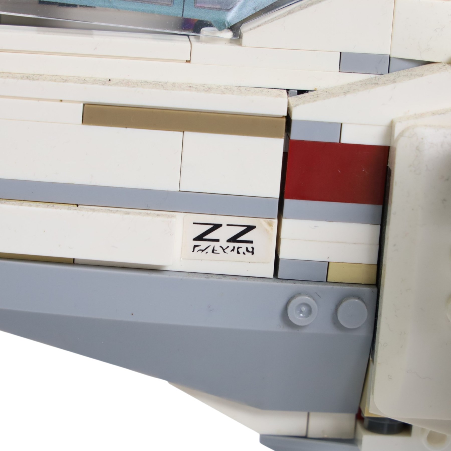 Three Lepin Star Wnrs built models, comprising Red Five X-Wing Starfighter no. 05039, Millennium Falcon no. 05132 and Super Star Destroyer no. 05028
