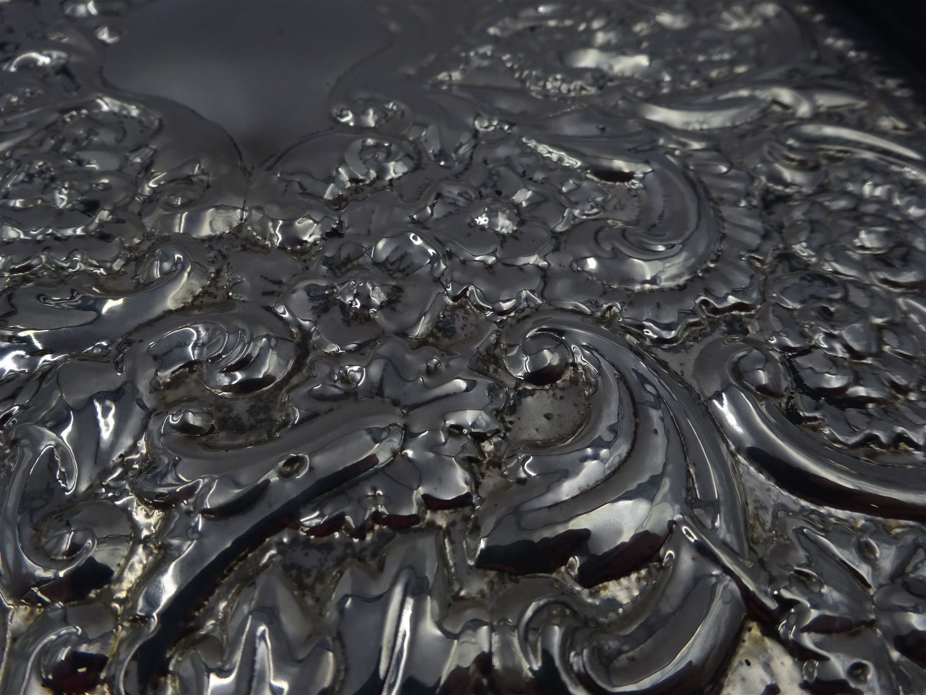 Modern silver mounted leather writing case, with repousse floral and foliate decoration to the silver cover, hallmarked Laurence R Watson & Co, Sheffield 1991, H29.5cm, boxed