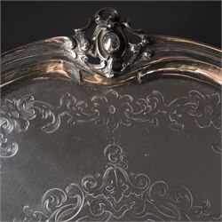 Victorian Scottish silver salver of shaped circular form with moulded border, engraved decoration and on pierced bracket feet D36cm Edinburgh 1854 Maker George Crichton 