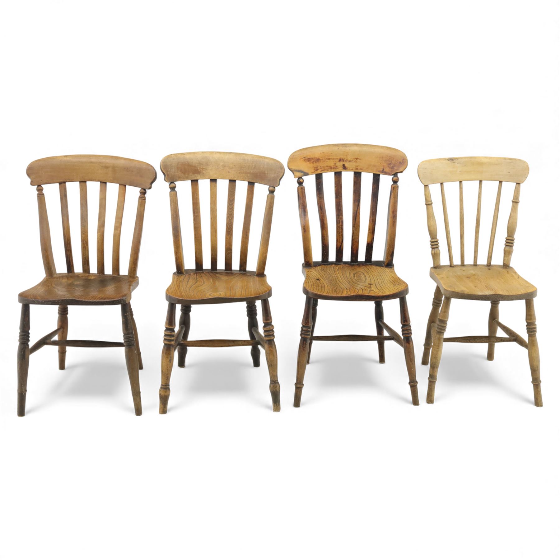 Eight Victorian farmhouse chairs in elm and beech, spindle-back frames with moulded seats, on turned and plain supports