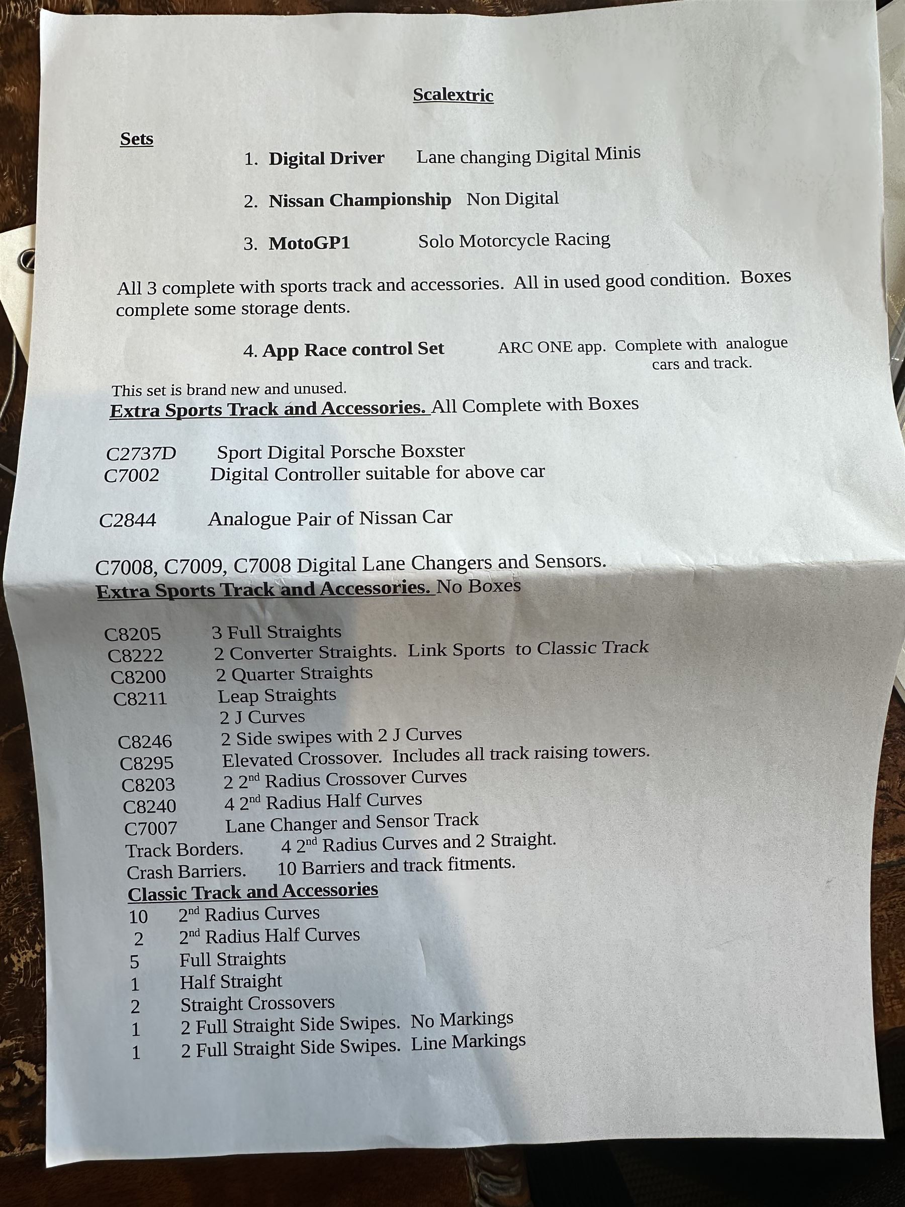 Quantity of Scalextric, including various sets; Digital Driver, Nissan Championship, Moto GP1, App Race control set and a collection of track and other accessories as per list