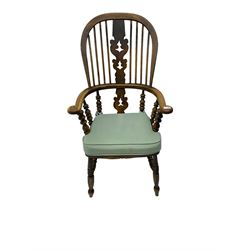 Late 19th century Yorkshire Windsor armchair, high stick back with pierced and fretwork splat, turned supports joined by H-stretcher