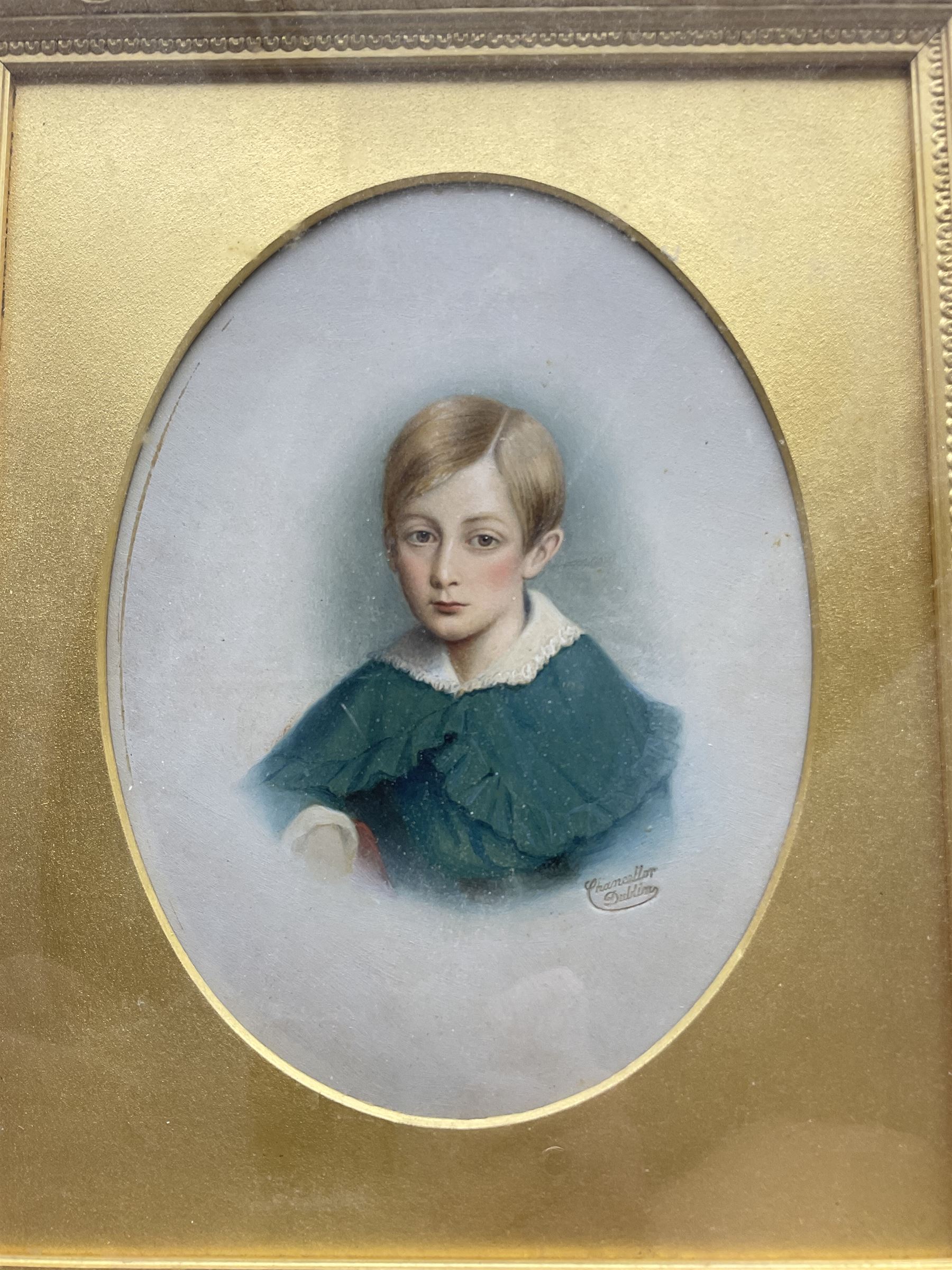 Victorian hand tinted photograph portrait depicting a boy, signed Chancellor Dublin, with other engravings and photographs