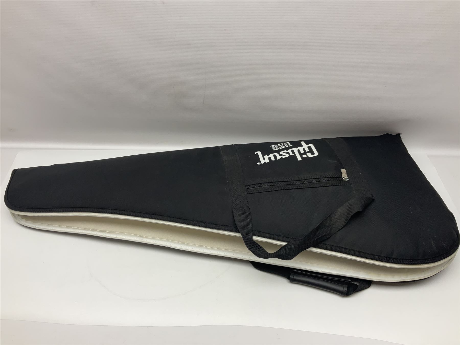 2012 American Gibson Les Paul Studio electric guitar, retro fitted with iron gear pick-ups, push-pull 'pots', roller bridge, string butler and locking machines, serial no.115321594, L99cm overall; in Gibson soft carrying case.