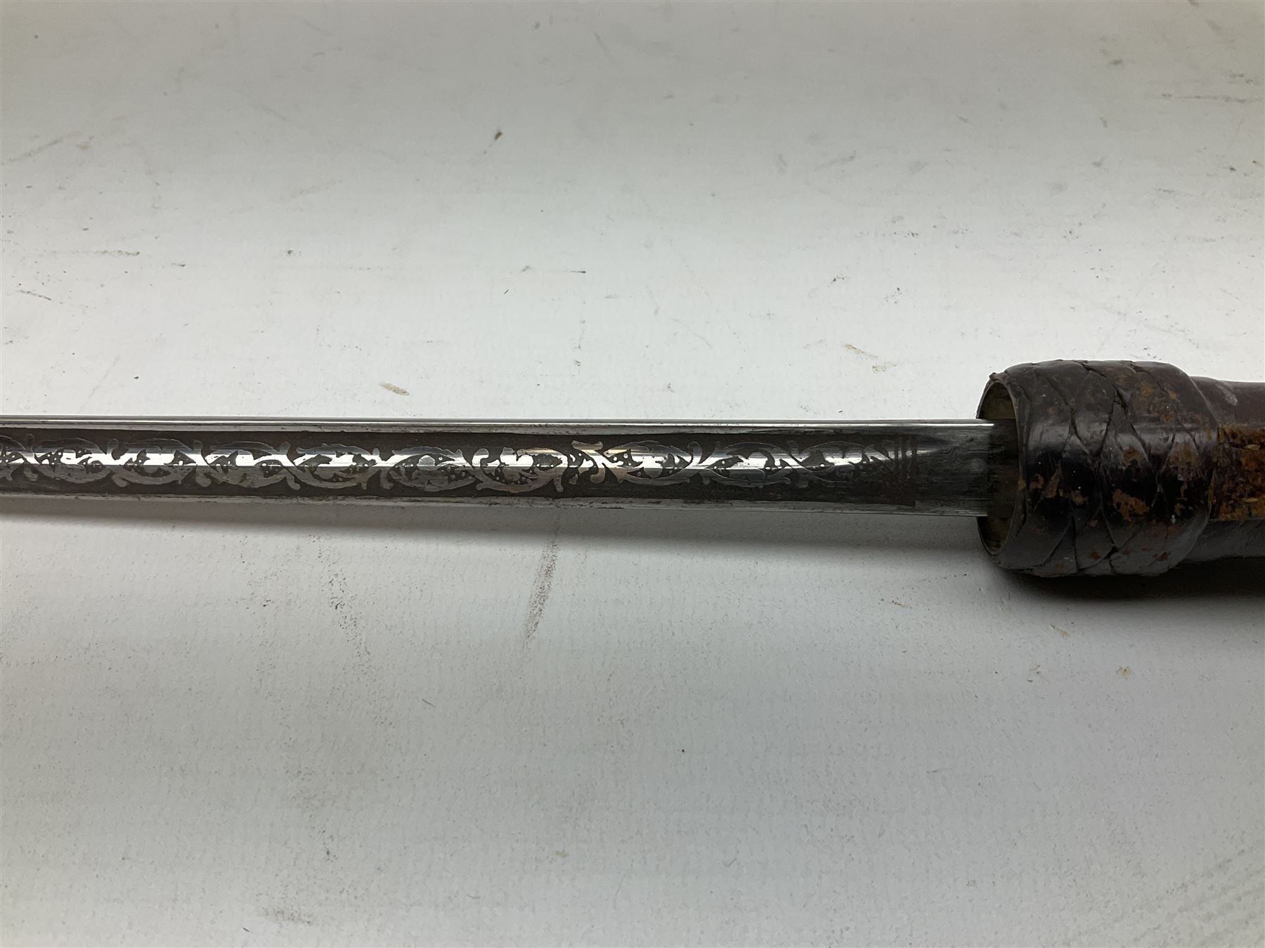 Early 20th century officer's swagger type leather covered sword stick, the 33cm etched single fullered blade marked Wilkinson Pall Mall, with carrying strap L60.5cm