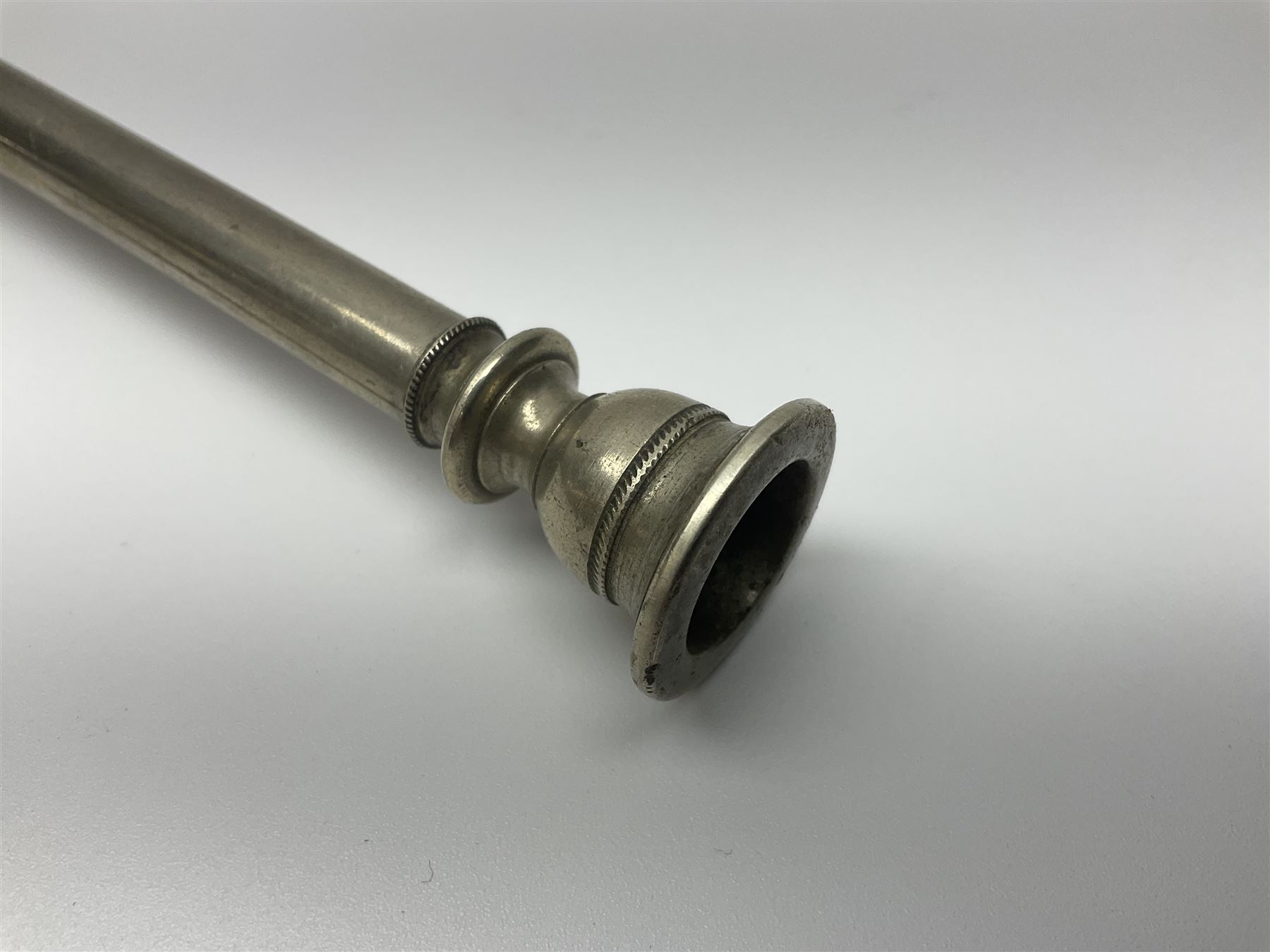 19th century telescopic hunting horn, the bell engraved 'The Beaufort', with makers mark Kohler & Son, makers, 61 Victoria Street, Westminster (from Covent garden) London, in a leather sheath, horn full extended L91cm 