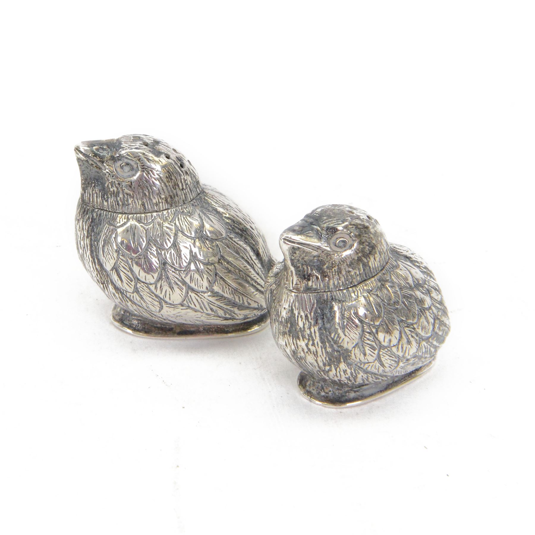 Pair of Edwardian silver novelty peppers, modelled as chicks, hallmarked Charles & George Asprey, London import 1906, H4cm