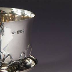 Early 20th century silver porringer, decorated in relief with foliate decoration and later engraving to body, upon a stepped circular foot, with matching cover/stand, both hallmarked Johnson, Walker & Tolhurst, London 1913, H8cm