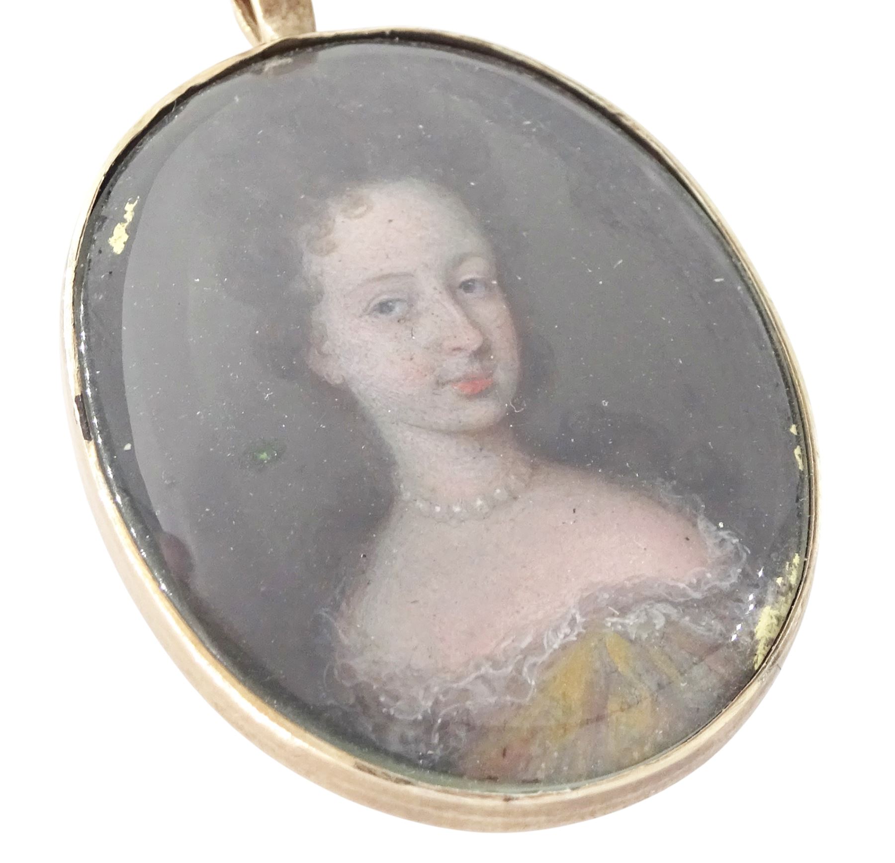 English School (17th century): Portrait miniature of a woman in a lace trimmed and pearl necklace, oil on copper, within an oval metal frame