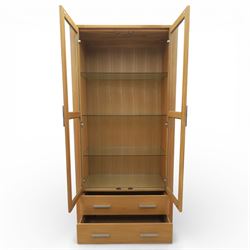 Solid light oak bookcase display cabinet, fitted with two glazed cupboards and two drawers