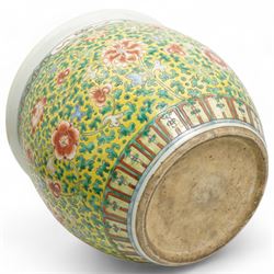 19th century Chinese famille jaune jardiniere decorated with trailing flowers and leaves on a yellow ground H34cm x 40cm