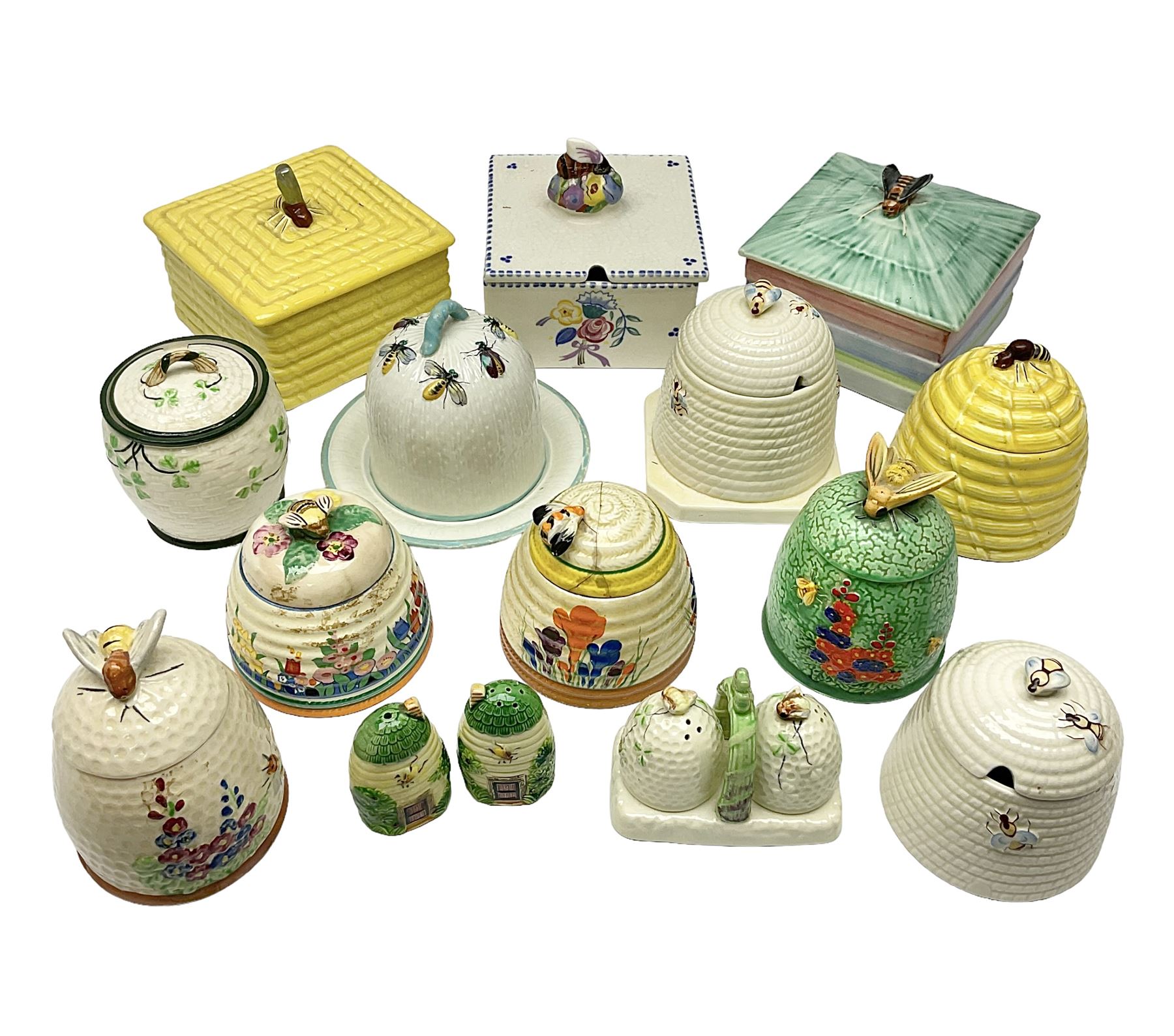 Clarice Cliff for Wilkinson Ltd Crocus Bizarre beehive honeypot painted in the Crocus pattern, together with two beehive Beswick honey pots, Poole square honey pot etc (14)