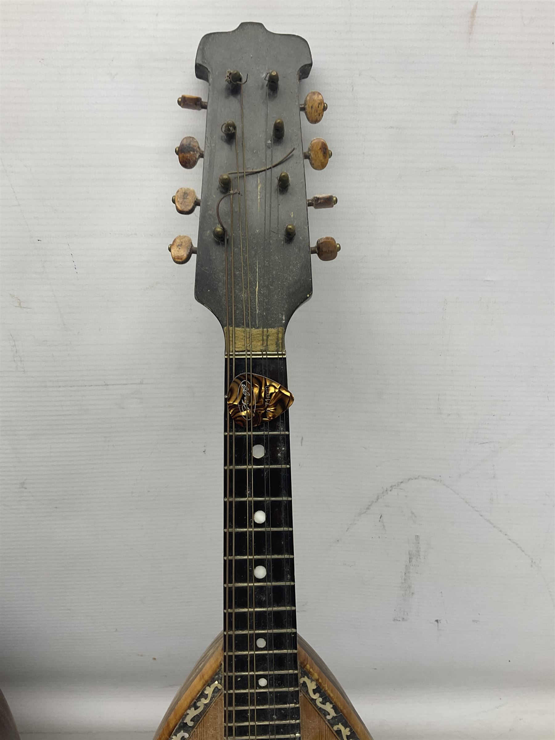 Italian bouzouki type long necked mandolin with segmented lute back and spruce top with tortoiseshell style panels; bears label 'Miroglio & Figli Sicilia Catania Italia' L99cm; and Italian lute back mandolin with segmented back and spruce top bearing label for F. De Mureda Napoli (2)